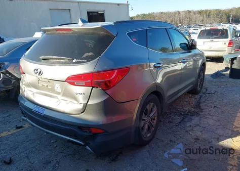2014 Hyundai Santa Fe Sport 2.4L z USA, uszkodzony, nr VIN 5XYZU3LBXEG181085